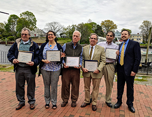 Clean Water Champions (L to R): David Silvia (accepting on behalf of his son, Andrew Silvia), Alicia Leher, Ken Payne, State Senator Josh Miller, and Jerry Elmer with Rhode Island Clean Water Action Director Johnathan Berard. Clean Water Champions (L to R): David Silvia (accepting on behalf of his son, Andrew Silvia), Alicia Leher, Ken Payne, State Senator Josh Miller, and Jerry Elmer with Rhode Island Clean Water Action Director Johnathan Berard.
