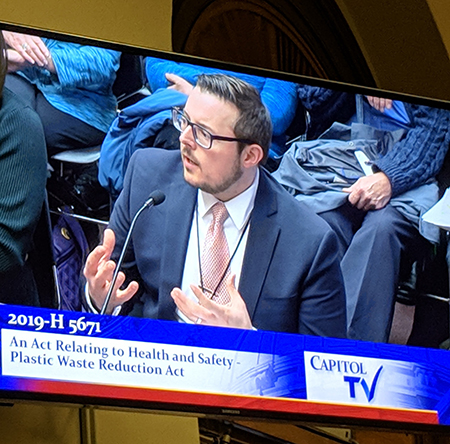 Rhode Island Clean Water Action Director Johnathan Berard testifying at the State Capitol regarding H 5701, which would ban single-use plastic checkout bags in Rhode Island. Rhode Island Clean Water Action Director Johnathan Berard testifying at the State Capitol regarding H 5701, which would ban single-use plastic checkout bags in Rhode Island.