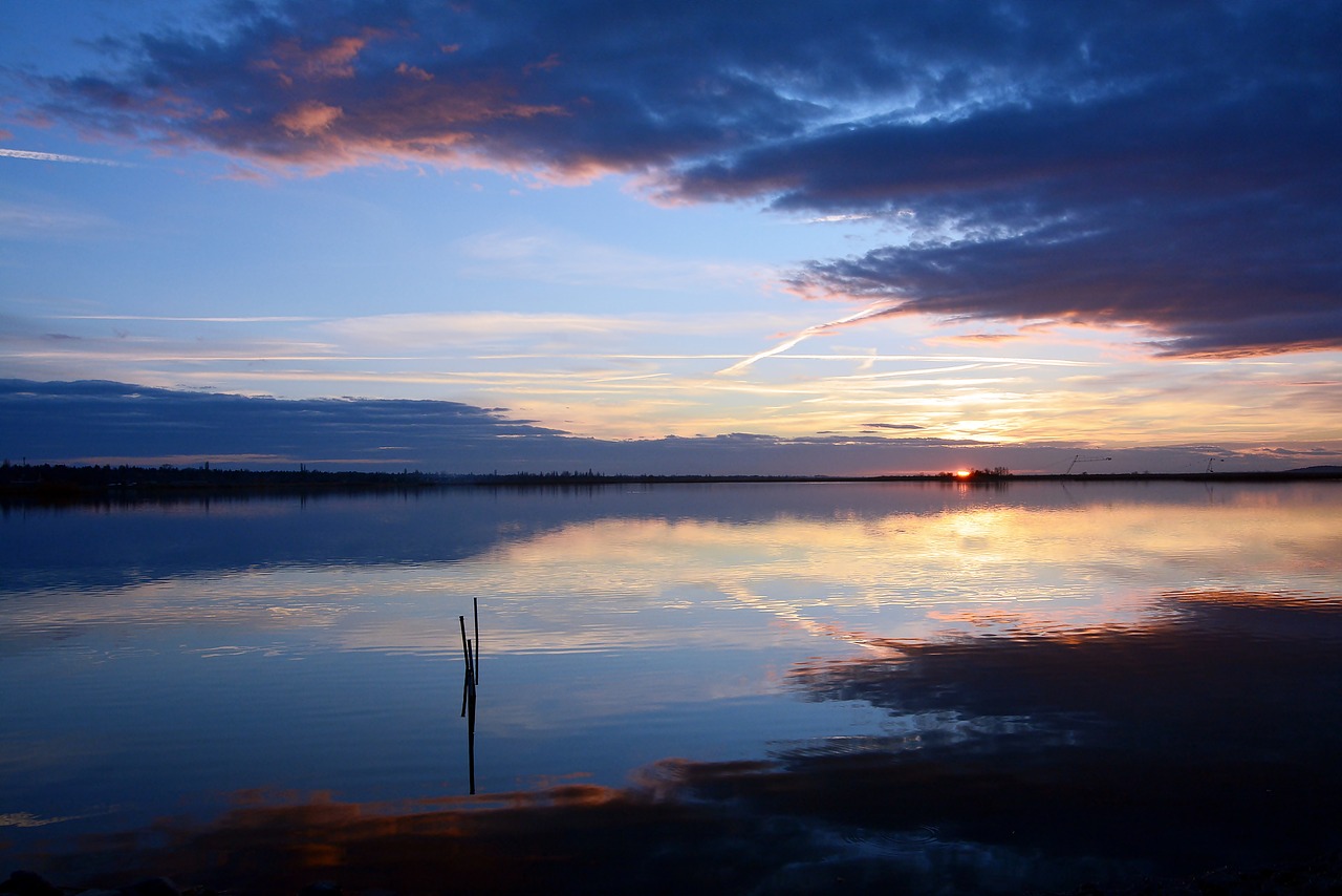 body of water at sunset