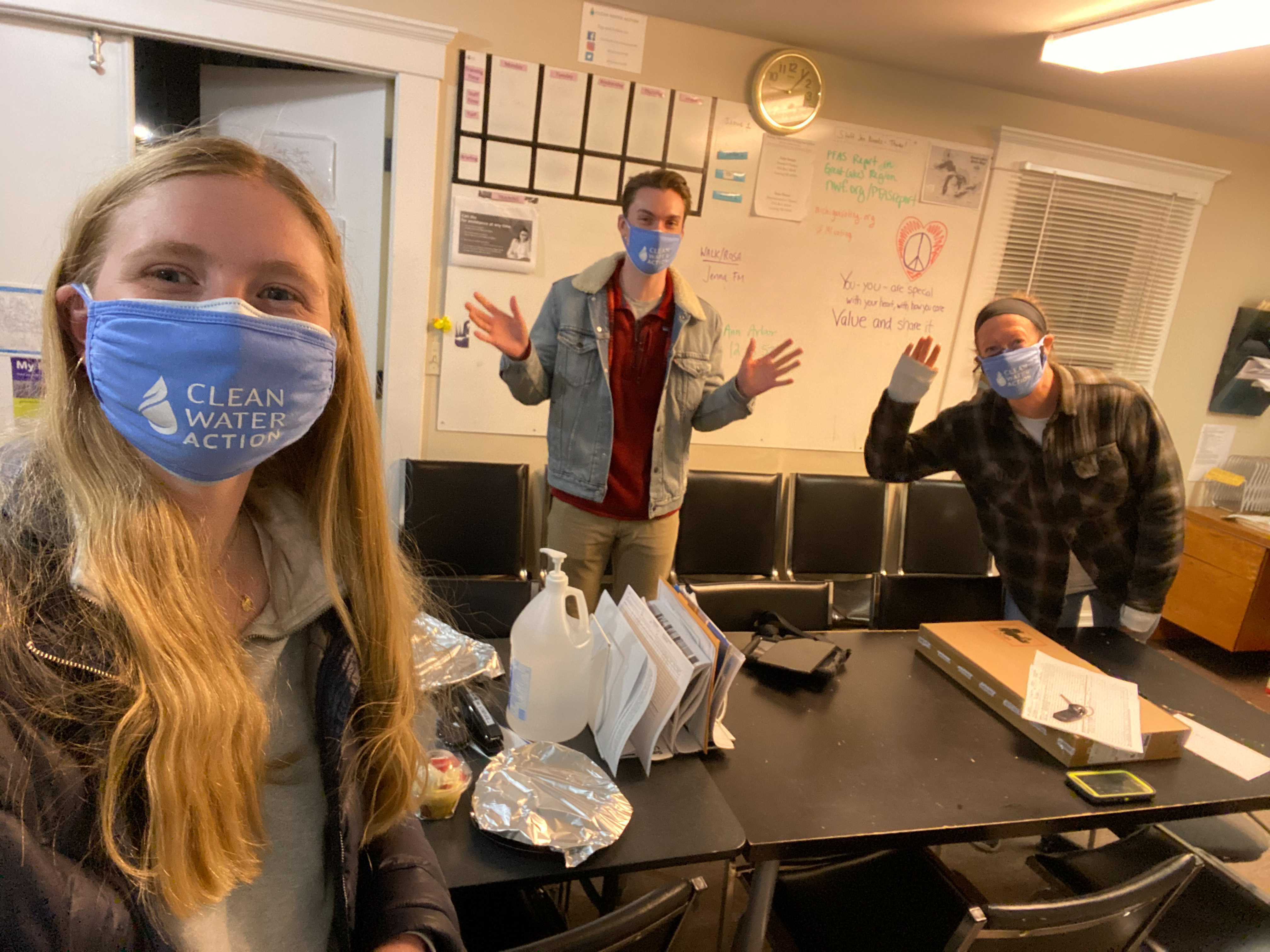 Picture of canvassers waving with Clean Water Action masks