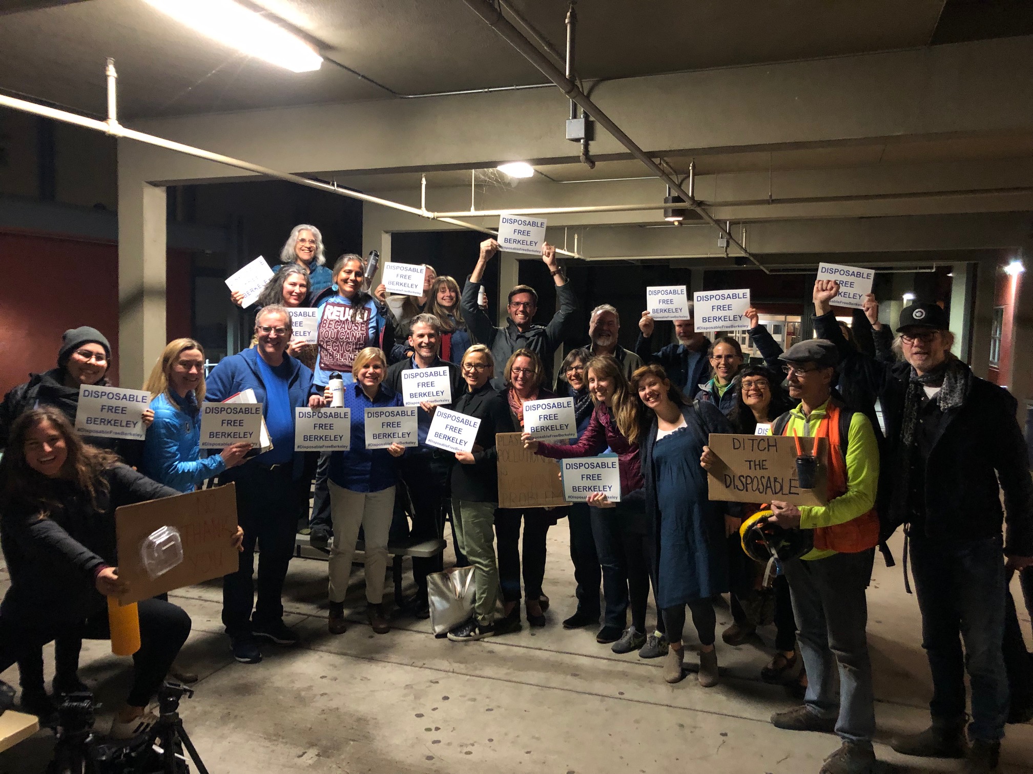 Community advocates, including ReThink Disposable team members, celebrate the passage of the Berkeley ordinance