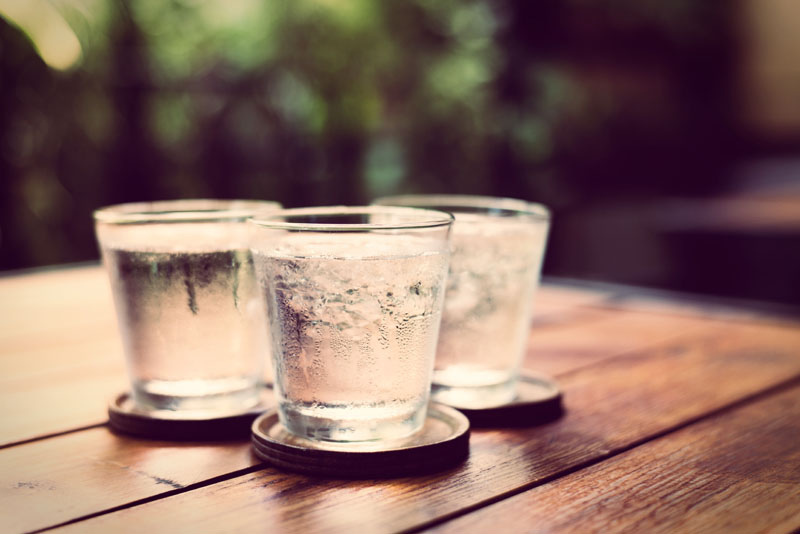 Three glasses of water on a table. Photo credit: bunyarit / Shutterstock Three glasses of water on a table. Photo credit: bunyarit / Shutterstock