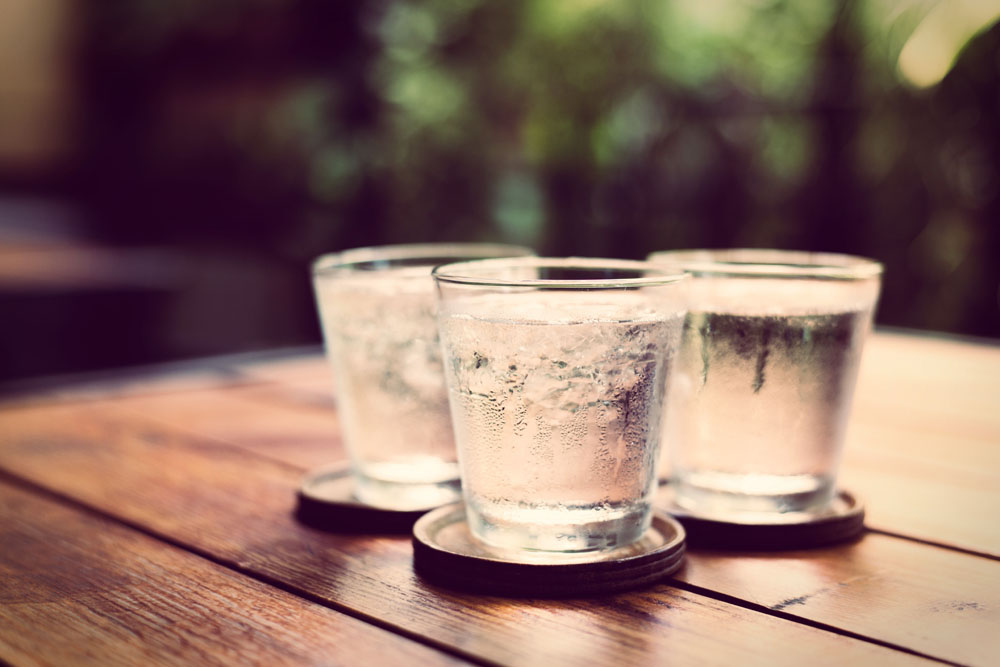 Three glasses of water on a table. Photo credit: bunyarit / Shutterstock Three glasses of water on a table. Photo credit: bunyarit / Shutterstock