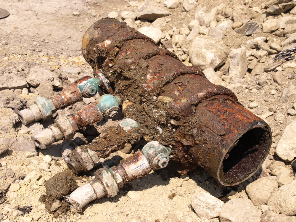 Corroded pipe with lead service fittings. Credit: Mike Thomas / Creative Commons Corroded pipe with lead service fittings. Credit: Mike Thomas / Creative Commons